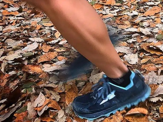 Altra 4.5 trail running show on a leafy trail.