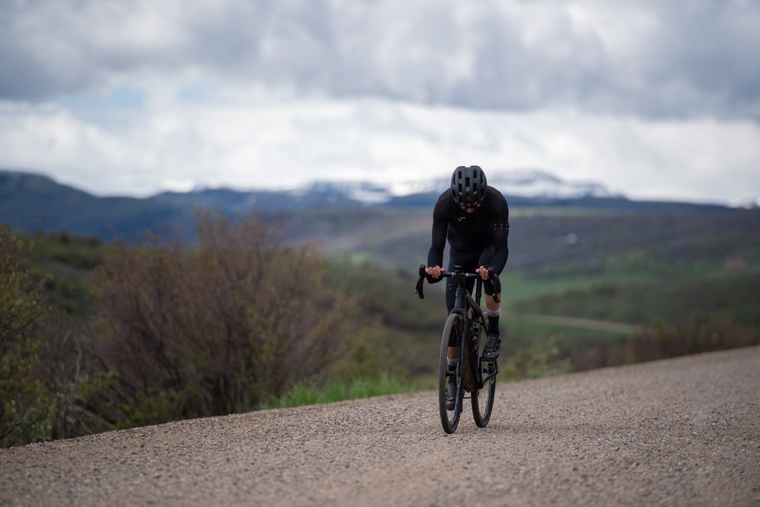 Bike rider on a gravel road