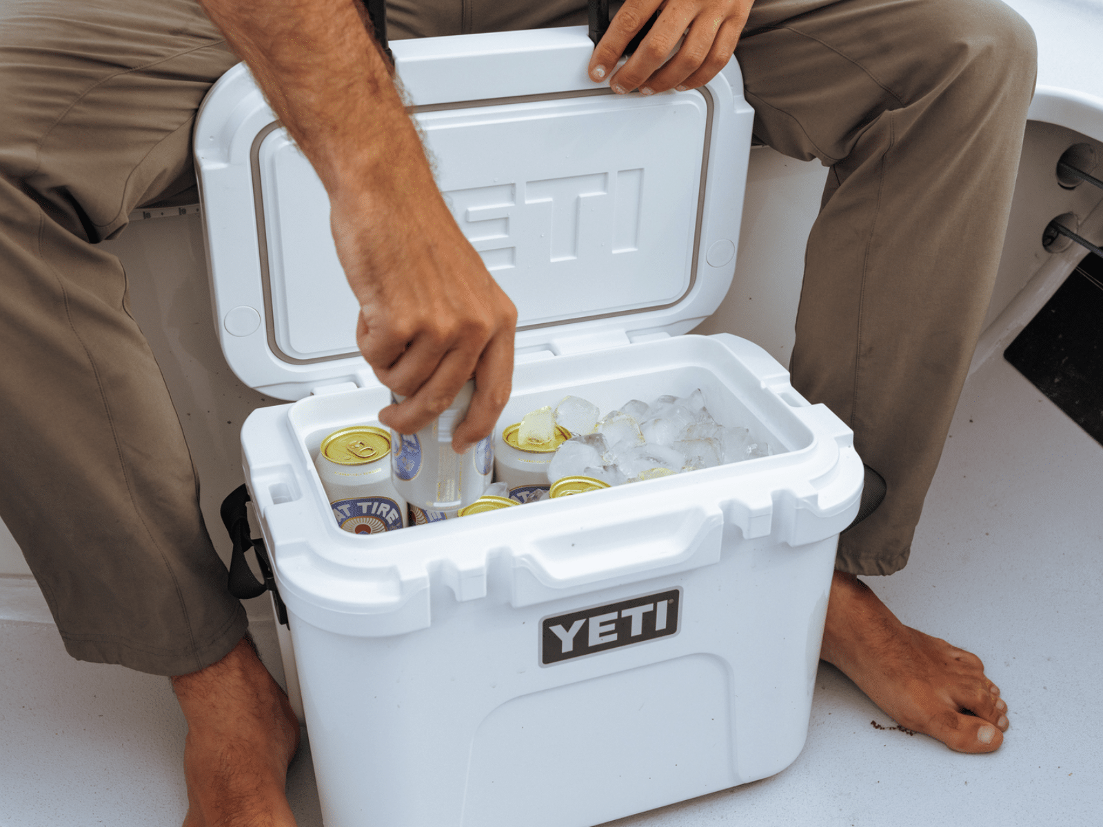 Yeti Roadie 15 in white full of beers on a boat