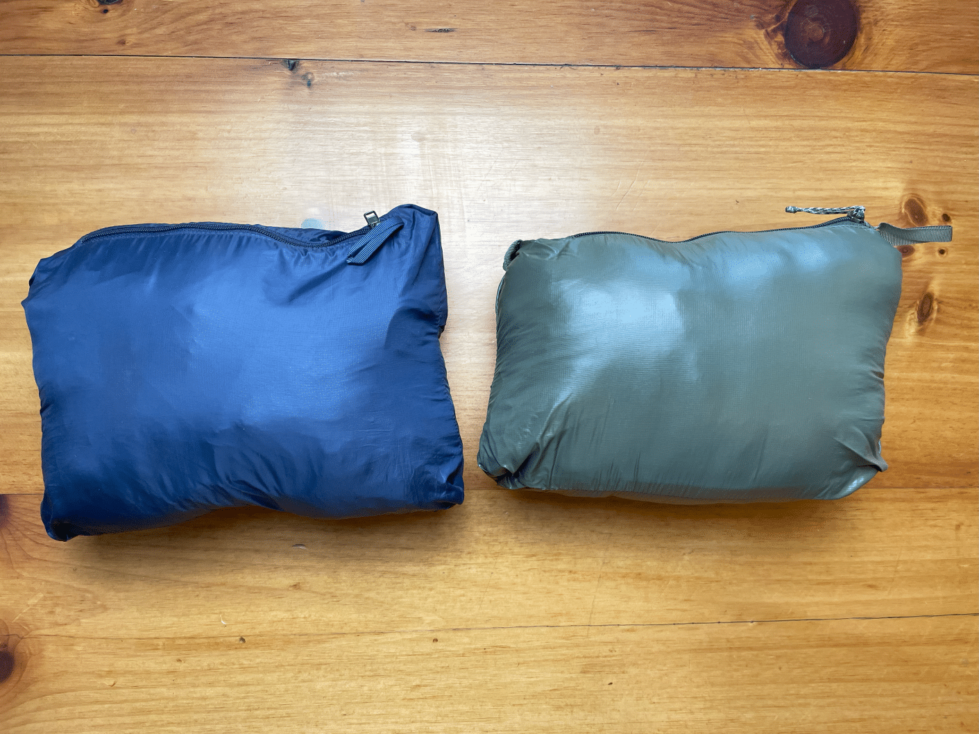 Image showing the Patagonia Nano Puff Vs Micro Puff when stuffed in their pockets.