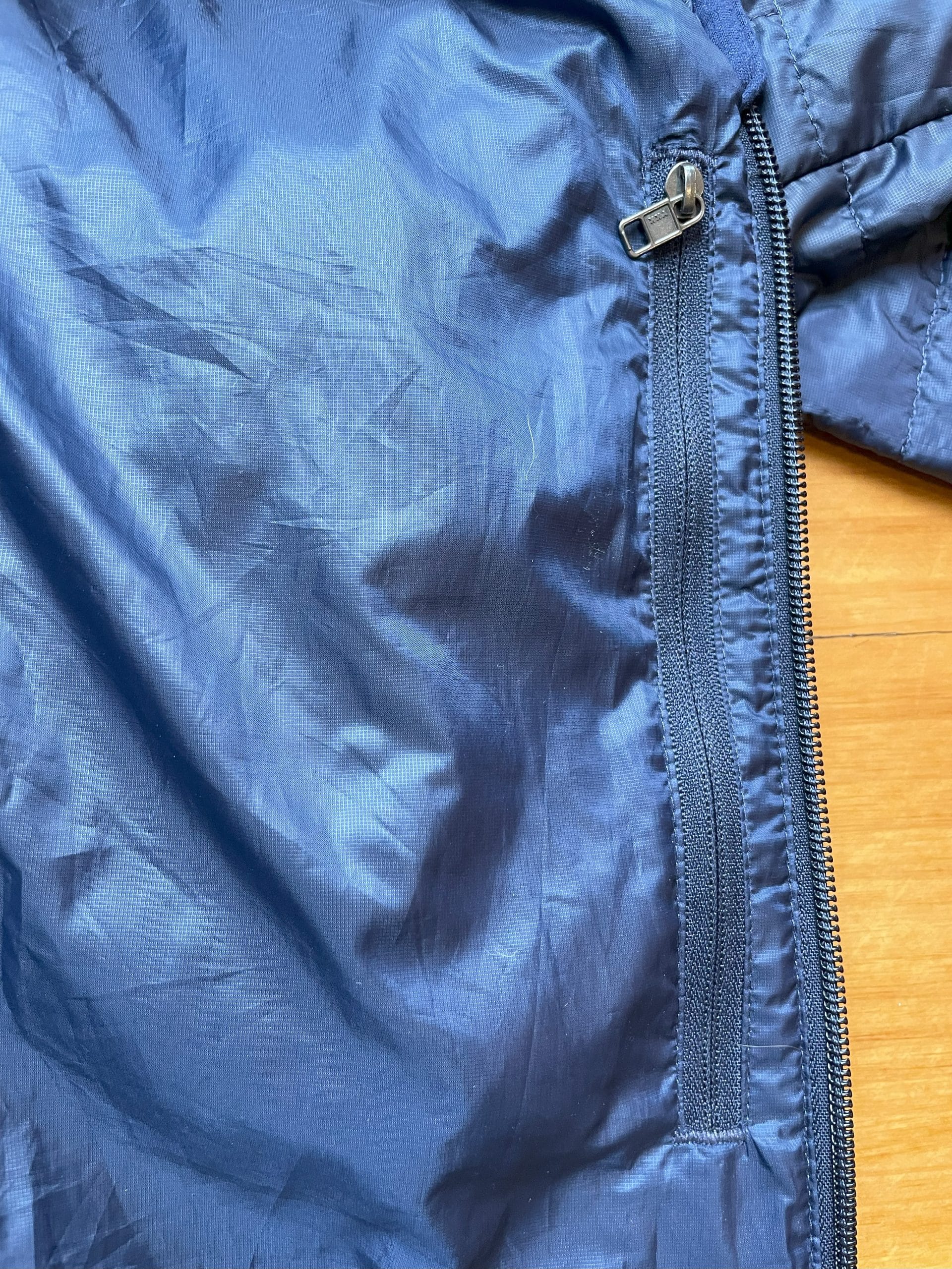 image of the check pocket on a Patagonia Nano Puff jacket