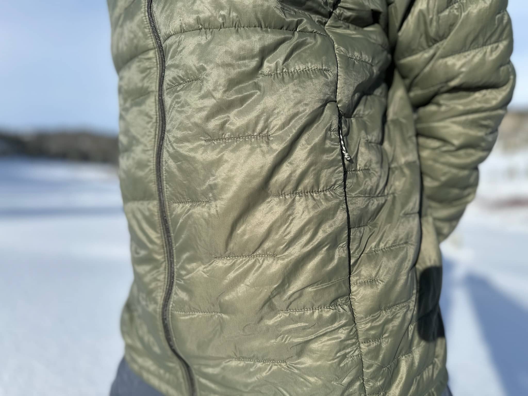 A closeup view of the fabric on a Patagonia Micropuff jacket