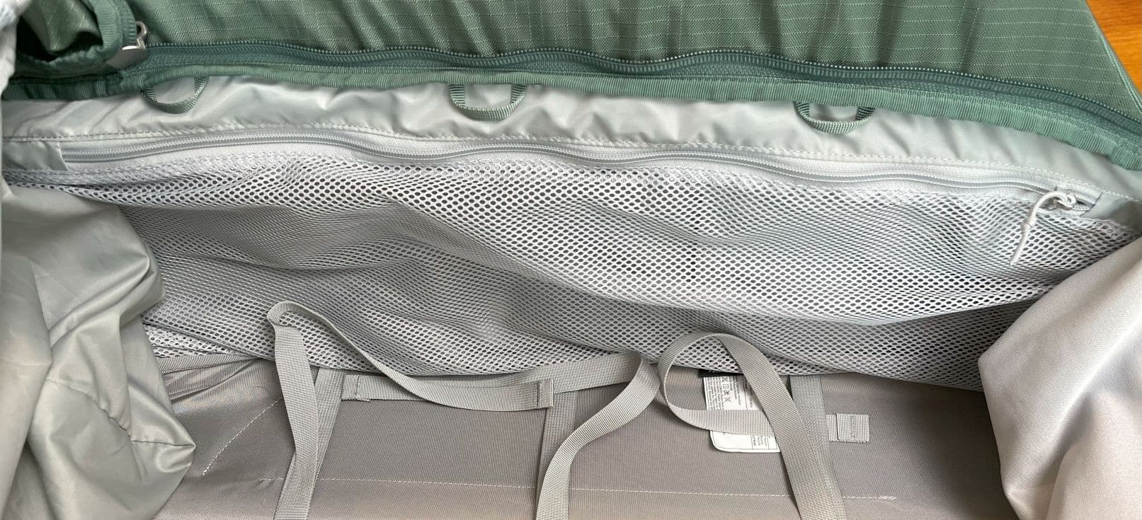 One of the interior pockets on the Osprey Sojourn Shuttle 100L travel duffel.