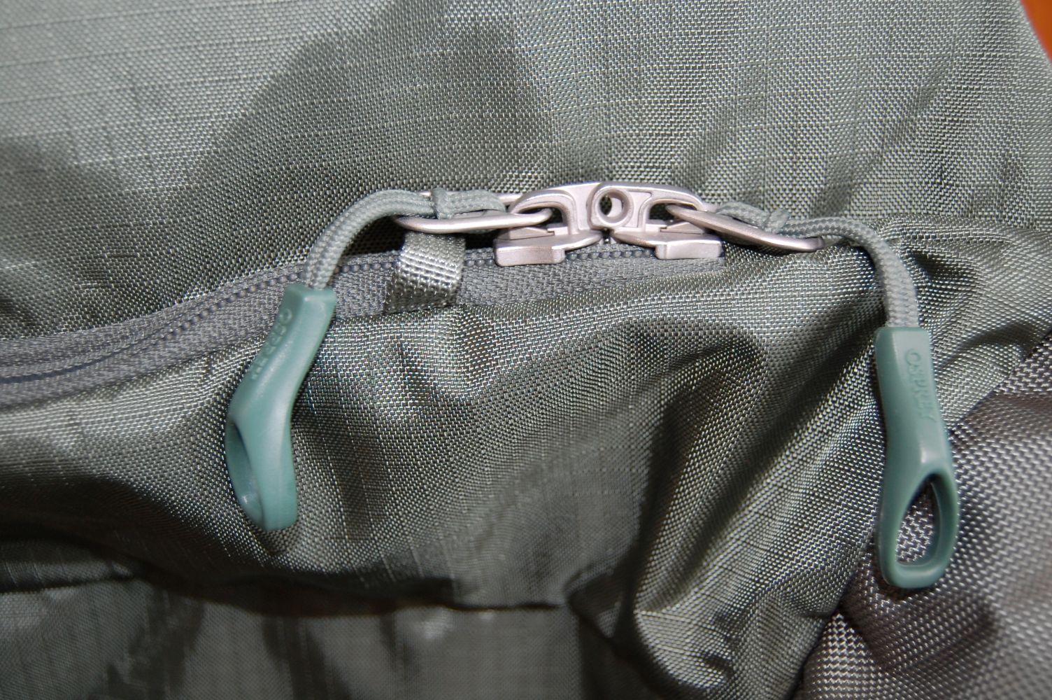 The main zipper on the Osprey Sojourn Shuttle 100L wheeled travel duffel.