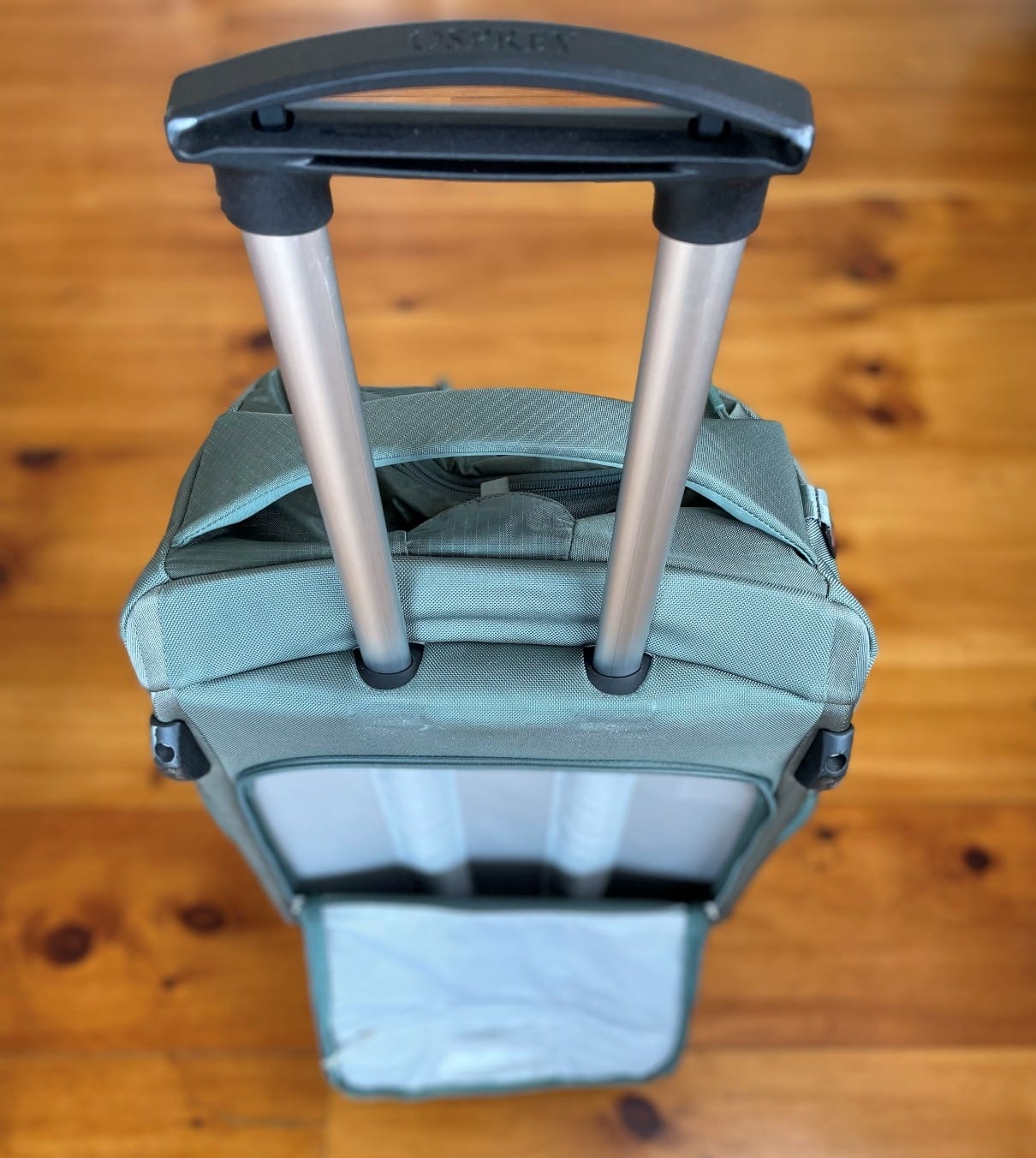 The telescoping handle on the Osprey Sojourn Shuttle 100L