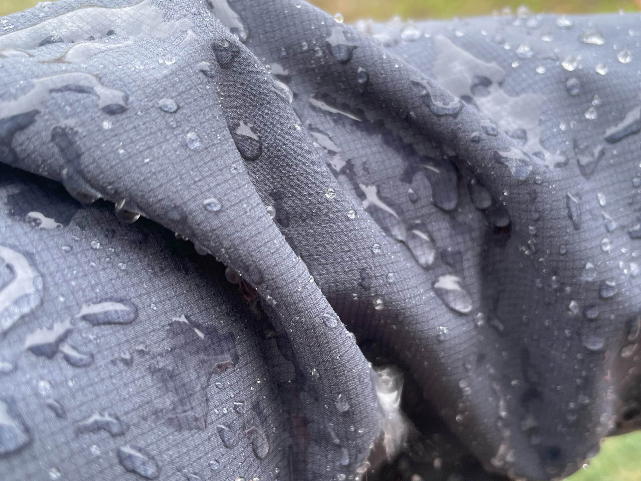 Closeup of the sleeve on a Patagonia Nano Air Ultralight in the rain.