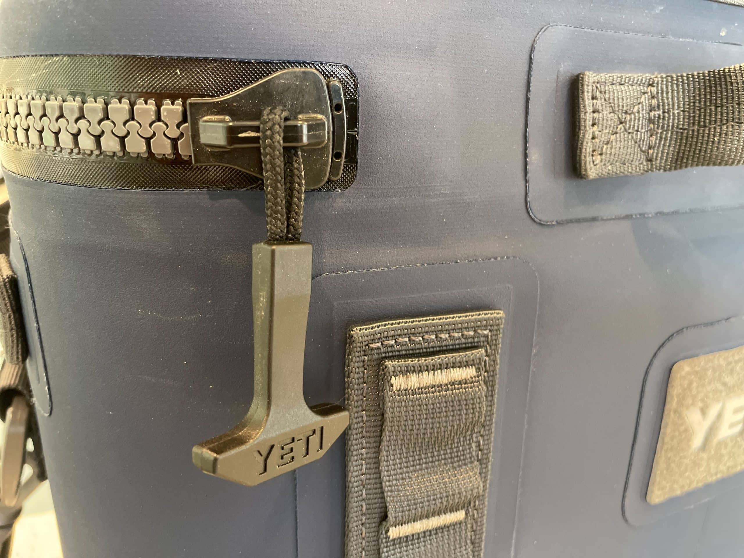 The closed zipper of the Yeti Hopper Flip 18 soft cooler.
