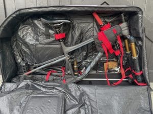 A mountain bike packed in the Evoc Travel Bag Pro.