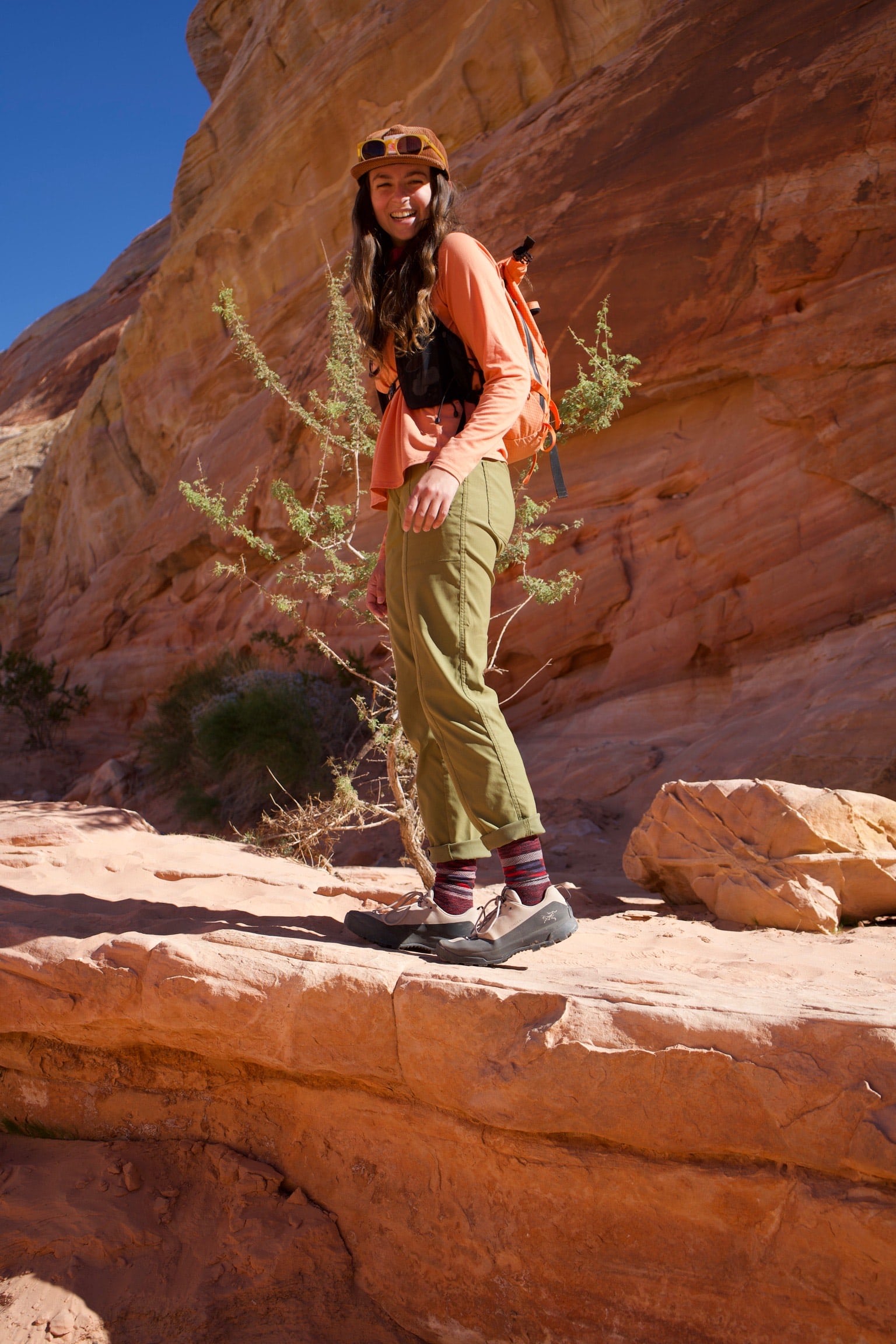 A women hiking in the Arc'teryx Konseal shoe.