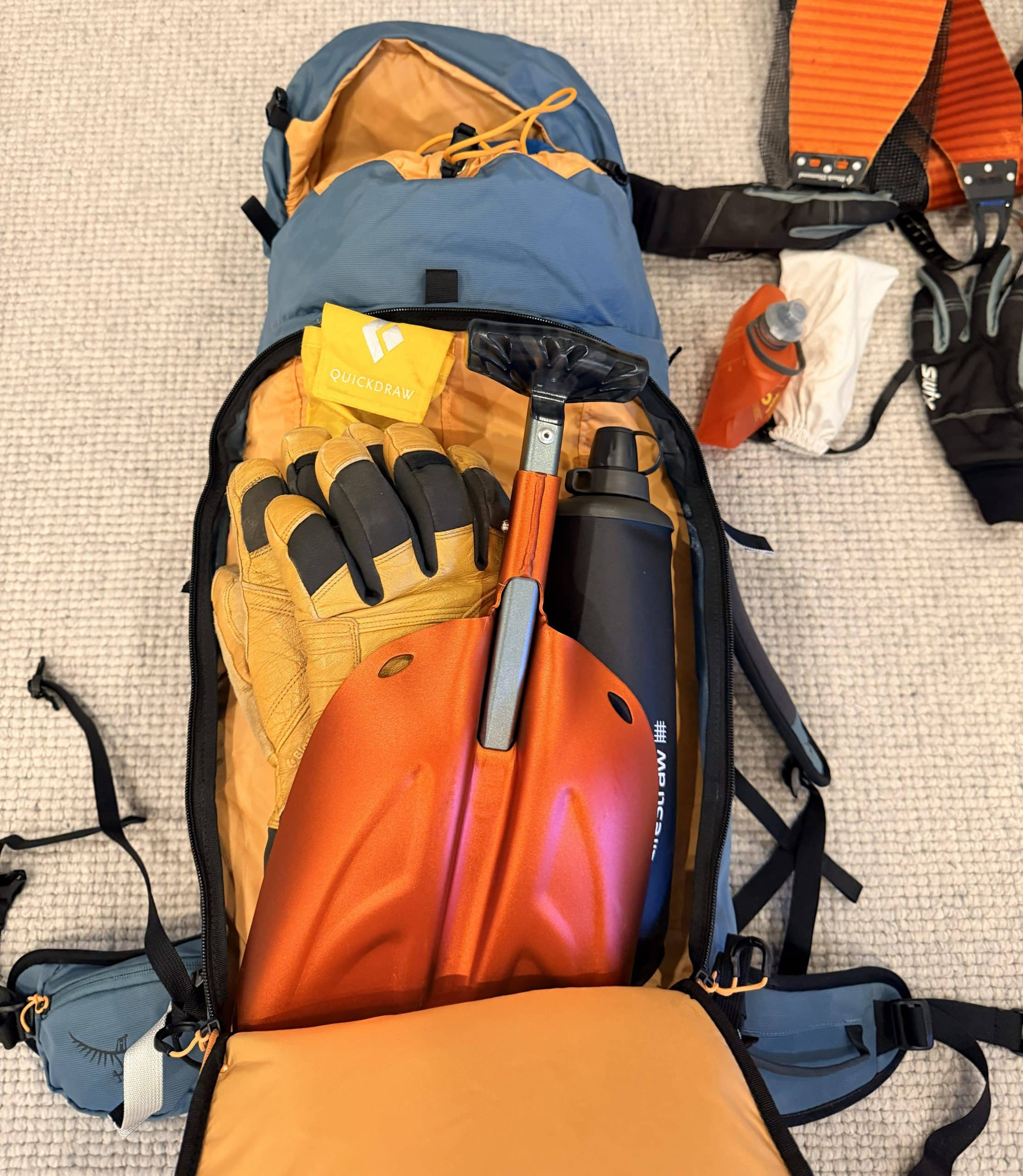 The safety pocket on the Osprey Soelden 45 ski backpack.