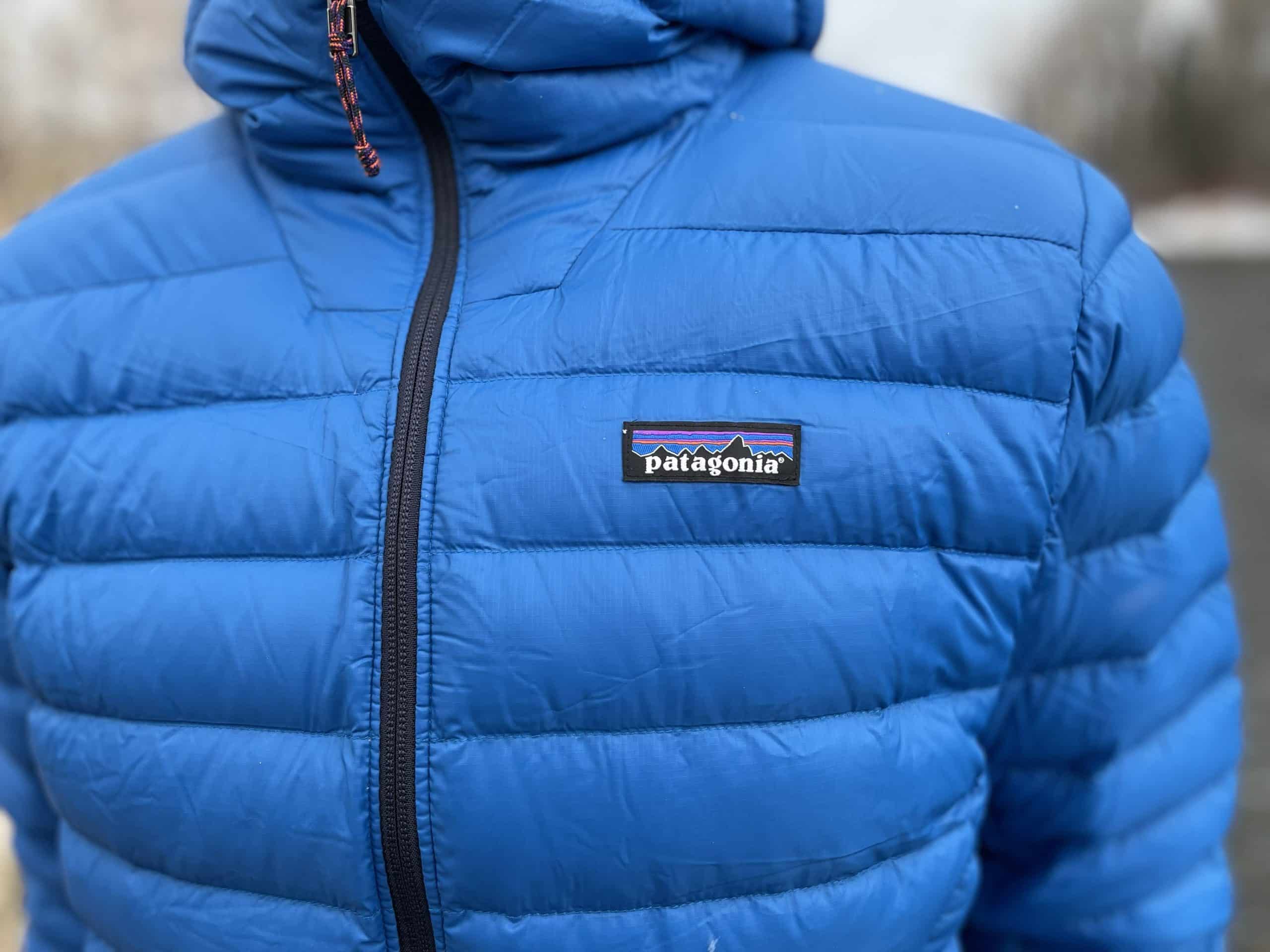 Closeup of the chest on a Patagonia Down Sweater in blue.