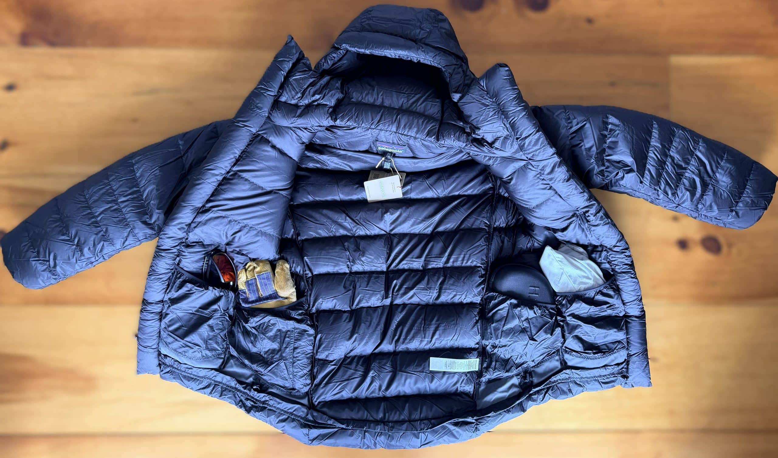 The interior of the Patagonia Grade VII Parka showing internal dump pockets.