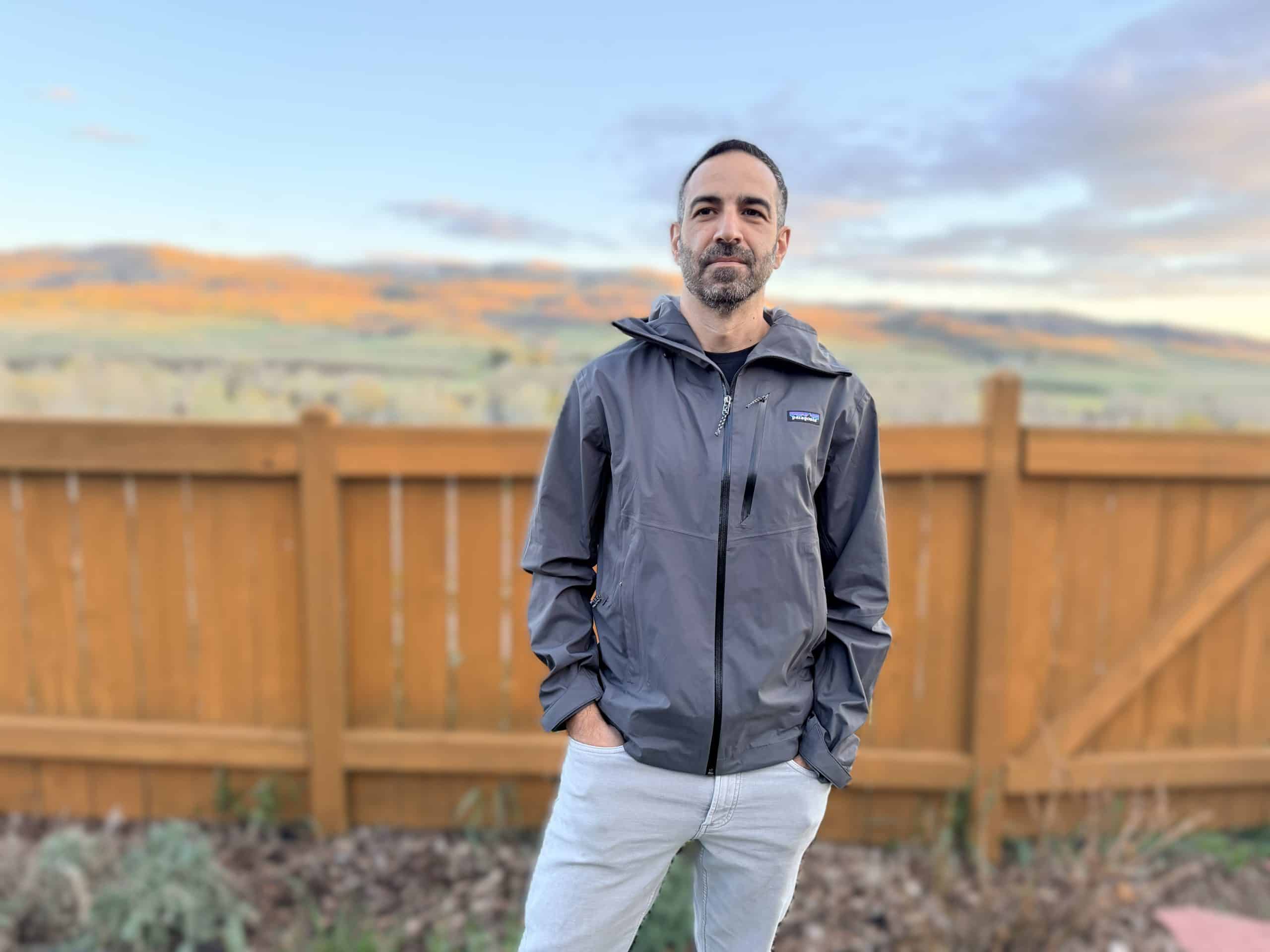 A man wearing the Patagonia Granite Crest rain jacket.