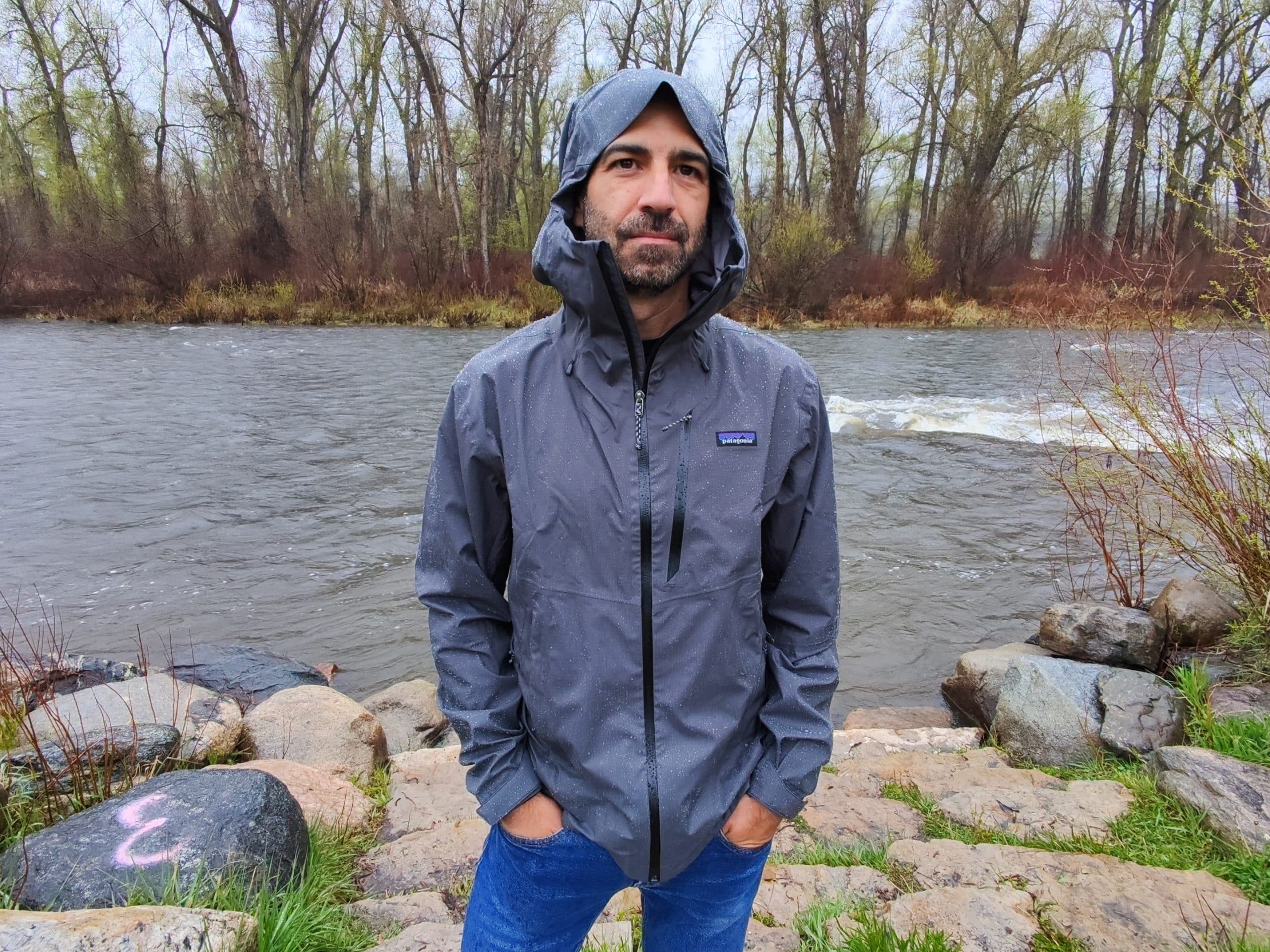 Standing in the rain wearing the Patagonia Granite Crest.