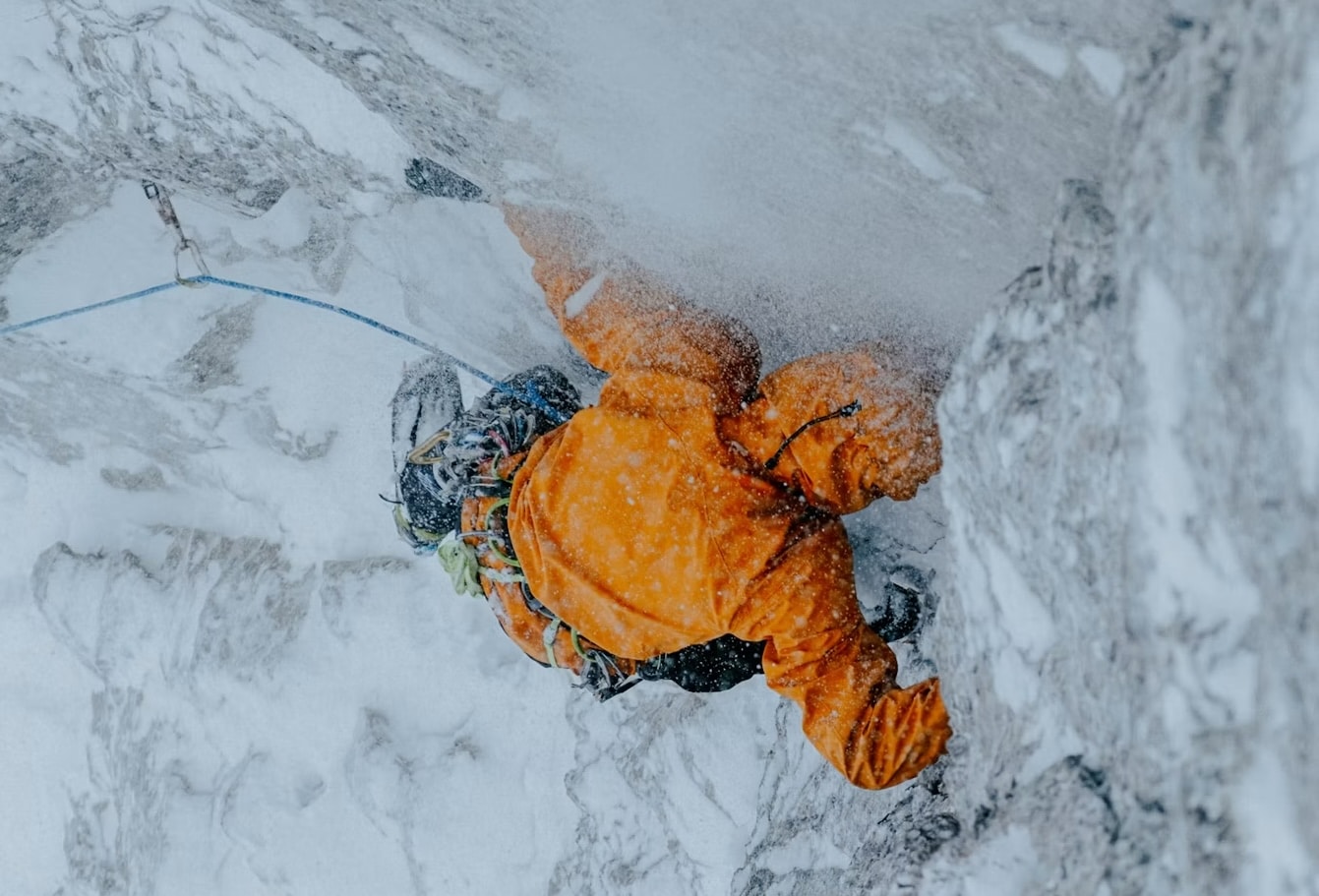 arc'teryx sperro sv jacket ice climbing in snowstorm